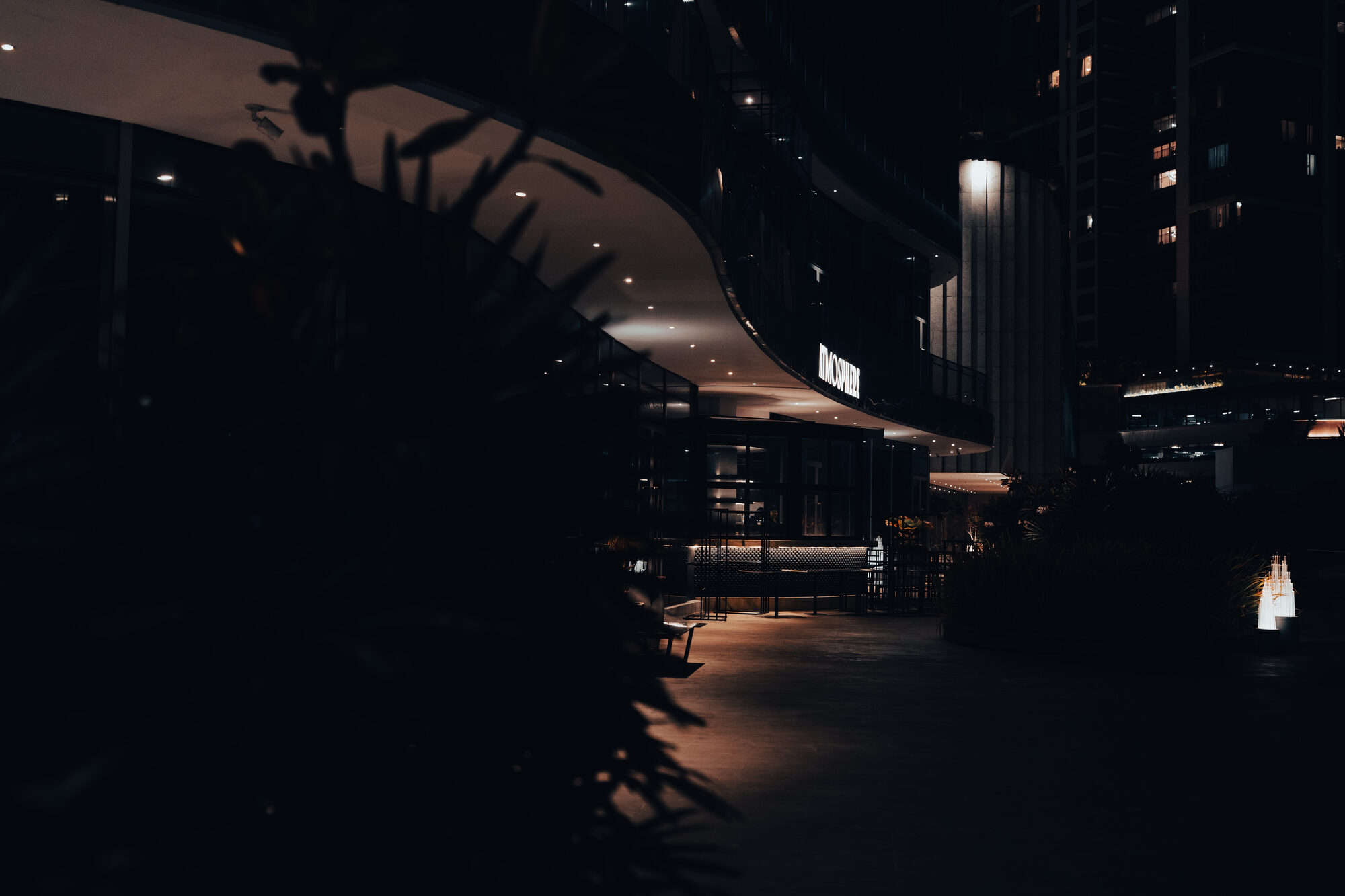 The Atmosphere courtyard entrance at night